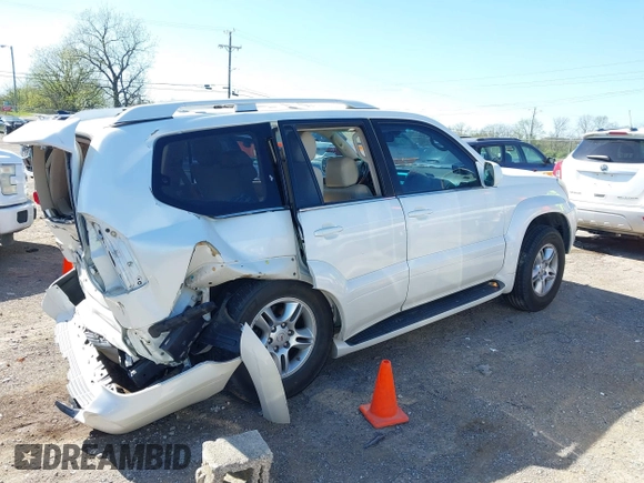 2007 Lexus GX with VIN JTJBT20X570145387, listed as a IAAI auction lot 42016545 with 153,907 mi miles and . Bid and sale history available at carsss.com. Image 4.