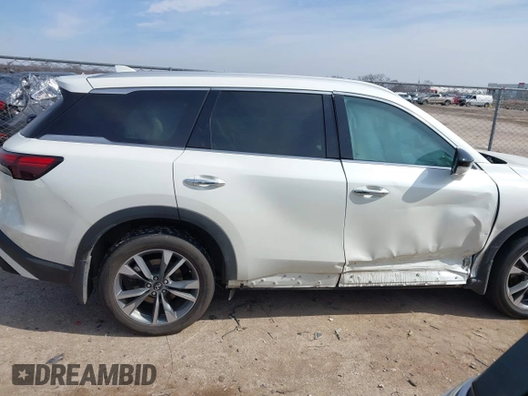 2023 Infiniti QX60 Luxe with VIN 5N1DL1FS8PC371340, listed as a IAAI auction lot 41579561 with 13,074 mi miles and . Bid and sale history available at DreamBid. Image 13.