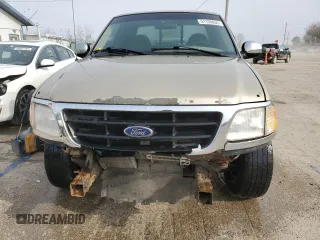 2000 Ford F-150 XL with VIN 2FTRX17W0YCA73568, listed as a Copart auction lot 51128035 with 208,737 mi miles and Salvage Title. Bid and sale history available at carsss.com. Image 5.