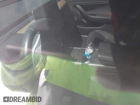 2019 Tesla Model 3 Mid Range z VIN 5YJ3E1EA3KF310976, wystawiony jako IAAI lot #41968012 z przebiegiem Nie podano mil oraz . Historia ofert i sprzedaży dostępna na DreamBid. Obrazek 7.