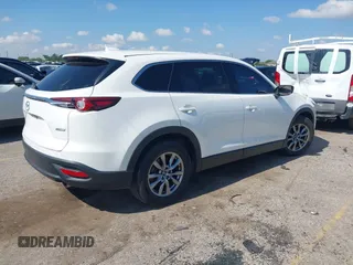 2019 Mazda CX-9 Touring with VIN JM3TCACY7K0314539, listed as a IAAI auction lot 42234361 with 98,299 mi miles and . Bid and sale history available at DreamBid. Image 4.