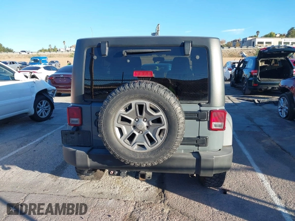 2014 Jeep Wrangler Unlimited Rubicon X with VIN 1C4BJWFG3EL134522, listed as a IAAI auction lot 41221381 with 66,897 mi miles and . Bid and sale history available at DreamBid. Image 16.