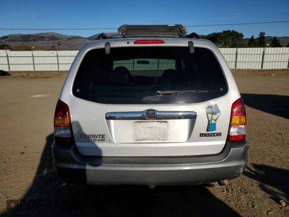 2001 Mazda Tribute LX with VIN 4F2CU08111KM20113, listed as a Copart auction lot 87681195 with 144,400 mi miles and Salvage Title. Bid and sale history available at DreamBid. Image 6.