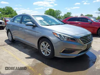 2015 Hyundai Sonata SE z VIN 5NPE24AF4FH169296, wystawiony jako IAAI lot #42190709 z przebiegiem 122 755 mil mil oraz . Historia ofert i sprzedaży dostępna na DreamBid. Obrazek 1.