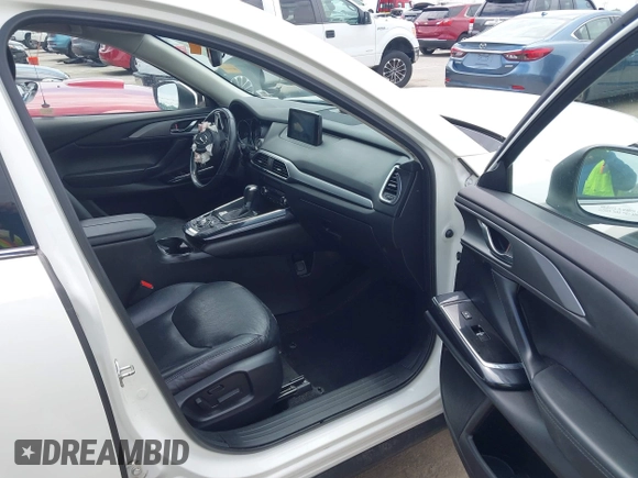 2018 Mazda CX-9 Touring с VIN JM3TCACY0J0214717, выставлен на аукционе IAAI как лот 42331827 с пробегом 116 470 миль миль и . История ставок и продаж доступна на DreamBid. Изображение 5.