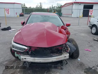 2019 Acura TLX with VIN 19UUB2F37KA003453, listed as a IAAI auction lot 40719757 with 98,628 mi miles and . Bid and sale history available at DreamBid. Image 13.