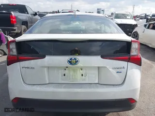 2021 Toyota Prius L Eco with VIN JTDKAMFUXM3144845, listed as a IAAI auction lot 41358306 with 1 mi miles. Bid and sale history available at carsss.com. Image 16.