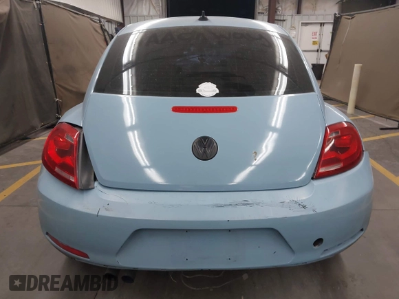 2014 Volkswagen Beetle 1.8T z VIN 3VWJ17AT8EM662235, wystawiony jako IAAI lot #42371906 z przebiegiem 118 173 mil mil oraz . Historia ofert i sprzedaży dostępna na DreamBid. Obrazek 16.