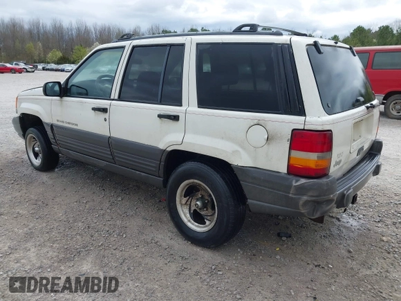 1996 Jeep Grand Cherokee Laredo with VIN 1J4FX58S1TC278511, listed as a IAAI auction lot 41837339 with 303,947 mi miles. Bid and sale history available at carsss.com. Image 3.