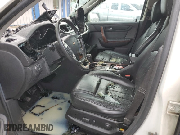 2014 Chevrolet Traverse LTZ z VIN 1GNKVJKD9EJ231164, wystawiony jako Copart lot #52876665 z przebiegiem Nie podano mil oraz Szkoda całkowita • Salvage title. Historia ofert i sprzedaży dostępna na DreamBid. Obrazek 7.