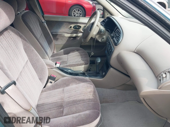 1997 Ford Contour LX with VIN 1FALP6533VK156310, listed as a IAAI auction lot 41567292 with 79,619 mi miles and . Bid and sale history available at DreamBid. Image 5.