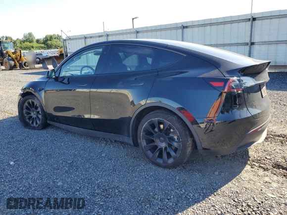 2023 Tesla Model Y Long Range z VIN 7SAYGDEE1PF865195, wystawiony jako Copart lot #57455765 z przebiegiem 32 011 mil mil oraz Szkoda całkowita • Salvage title. Historia ofert i sprzedaży dostępna na DreamBid. Obrazek 2.