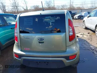 2012 Kia Soul + with VIN KNDJT2A65C7403543, listed as a IAAI auction lot 41633273 with 128,988 mi miles. Bid and sale history available at carsss.com. Image 16.