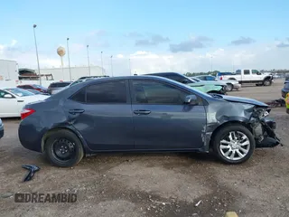 2016 Toyota Corolla L with VIN 5YFBURHE0GP385285, listed as a IAAI auction lot 41117161 with 62,916 mi miles and . Bid and sale history available at DreamBid. Image 14.