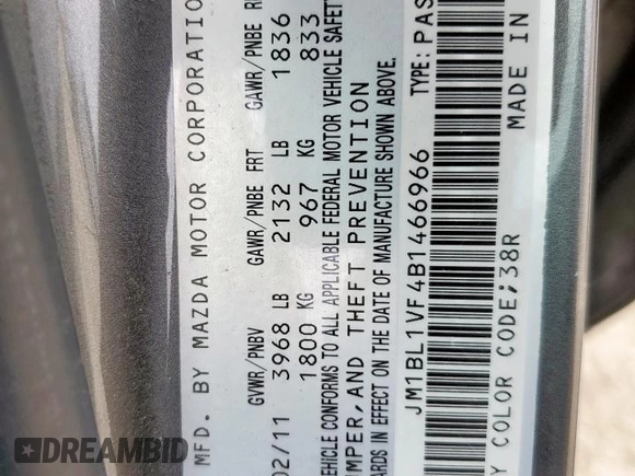 2011 Mazda 3 i Touring z VIN JM1BL1VF4B1466966, wystawiony jako Copart lot #57783245 z przebiegiem 154 806 mil mil oraz Szkoda całkowita • Salvage title. Historia ofert i sprzedaży dostępna na DreamBid. Obrazek 12.
