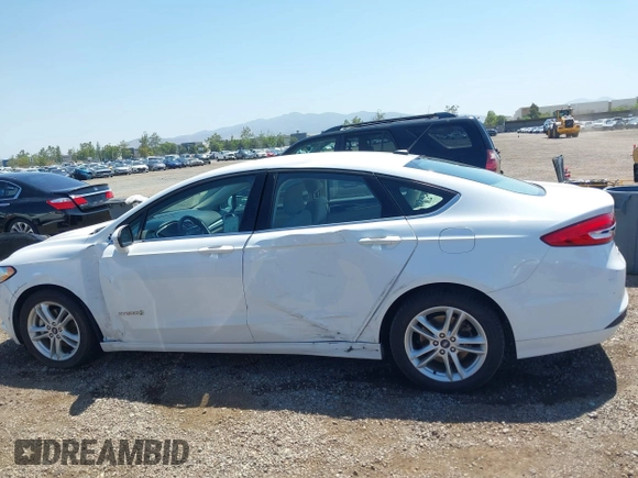 2018 Ford Fusion SE z VIN 3FA6P0LU2JR261268, wystawiony jako IAAI lot #42301578 z przebiegiem 63 357 mil mil oraz . Historia ofert i sprzedaży dostępna na DreamBid. Obrazek 14.