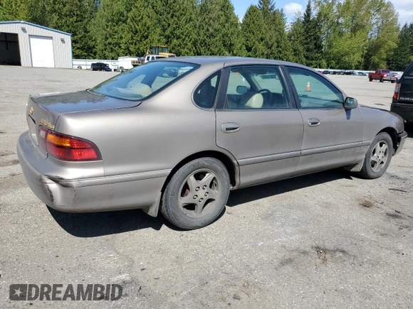 1998 Toyota Avalon XL with VIN 4T1BF18BXWU228989, listed as a Copart auction lot 53821495 with 157,209 mi miles and Salvage Title. Bid and sale history available at DreamBid. Image 3.
