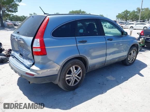 2010 Honda CR-V EX with VIN 5J6RE3H50AL006031, listed as a IAAI auction lot 42104423 with 209,418 mi miles and . Bid and sale history available at carsss.com. Image 4.