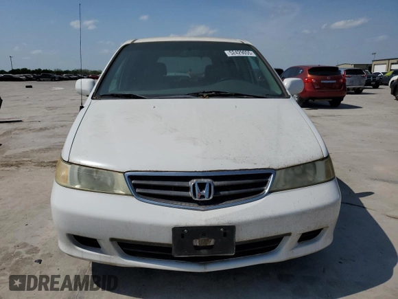 2004 Honda Odyssey EX-L with VIN 5FNRL18974B092979, listed as a Copart auction lot 52429055 with 106,515 mi miles and Clean Title. Bid and sale history available at DreamBid. Image 5.