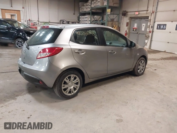 2012 Mazda 2 Sport with VIN JM1DE1KZ0C0149808, listed as a IAAI auction lot 42233078 with 166,111 mi miles and . Bid and sale history available at DreamBid. Image 4.