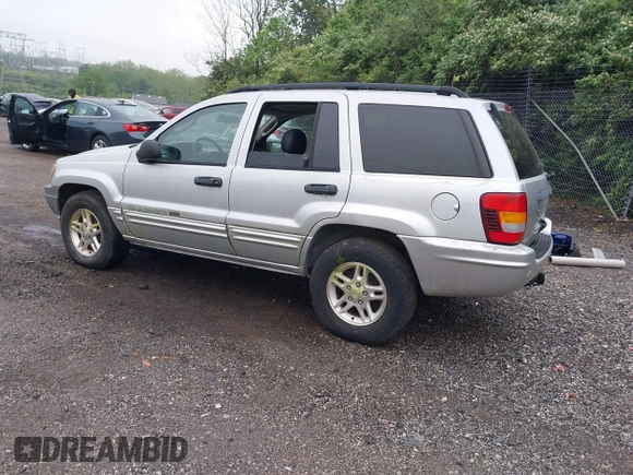 2004 Jeep Grand Cherokee Laredo with VIN 1J4GW48N34C145956, listed as a IAAI auction lot 42201114 with 137,815 mi miles and . Bid and sale history available at DreamBid. Image 3.