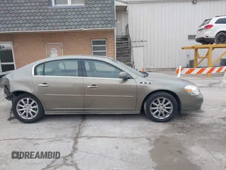 2011 Buick Lucerne CXL Premium with VIN 1G4HJ5EM0BU104715, listed as a IAAI auction lot 41706751 with 123,636 mi miles. Bid and sale history available at carsss.com. Image 13.