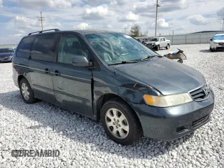 2003 Honda Odyssey EX-L z VIN 5FNRL18943B020961, wystawiony jako Copart lot #86009874 z przebiegiem 155 993 mil mil oraz Szkoda całkowita • Salvage title. Historia ofert i sprzedaży dostępna na DreamBid. Obrazek 4.