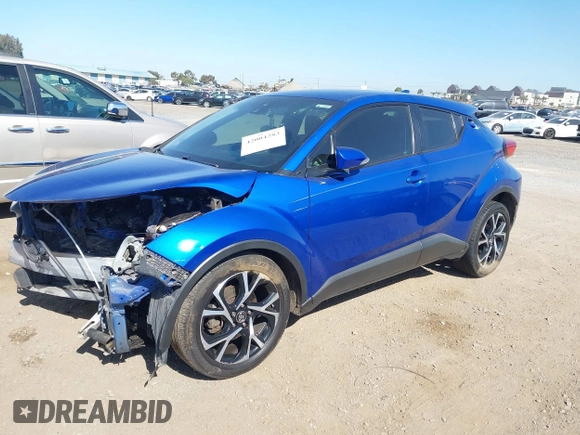 2018 Toyota C-HR XLE z VIN NMTKHMBXXJR007134, wystawiony jako IAAI lot #42004283 z przebiegiem 174 336 mil mil oraz . Historia ofert i sprzedaży dostępna na DreamBid. Obrazek 2.