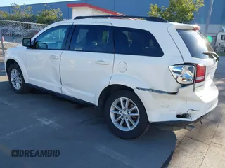 2015 Dodge Journey SXT with VIN 3C4PDCBG8FT673824, listed as a IAAI auction lot 41603661 with 169,939 mi miles and . Bid and sale history available at DreamBid. Image 3.