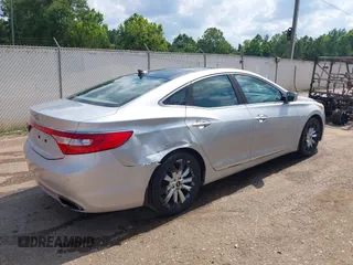 2012 Hyundai Azera z VIN KMHFH4JGXCA182208, wystawiony jako IAAI lot #42559319 z przebiegiem 236 086 mil mil oraz . Historia ofert i sprzedaży dostępna na DreamBid. Obrazek 4.