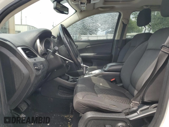 2012 Dodge Journey SXT with VIN 3C4PDCCG4CT243492, listed as a Copart auction lot 59908485 with 319,175 mi miles and Salvage title. Bid and sale history available at DreamBid. Image 7.