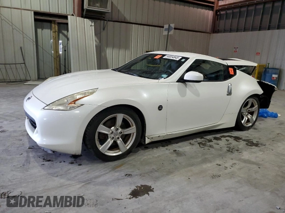 2012 Nissan 370Z z VIN JN1AZ4EH3CM565276, wystawiony jako Copart lot #56654845 z przebiegiem 77 788 mil mil oraz Nie do naprawy. Historia ofert i sprzedaży dostępna na DreamBid. Obrazek 1.