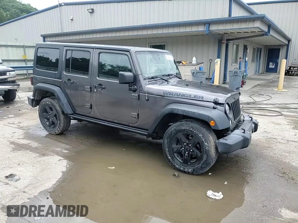 2016 Jeep Wrangler Unlimited Sport with VIN 1C4BJWDG1GL165418, listed as a Copart auction lot 61364095 with 123,772 mi miles and Salvage title. Bid and sale history available at DreamBid. Image 14.