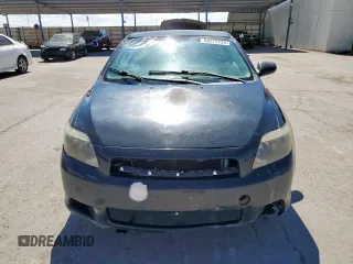 2005 Scion tC z VIN JTKDE177350049415, wystawiony jako Copart lot #59777735 z przebiegiem 272 617 mil mil oraz Szkoda całkowita • Salvage title. Historia ofert i sprzedaży dostępna na DreamBid. Obrazek 5.