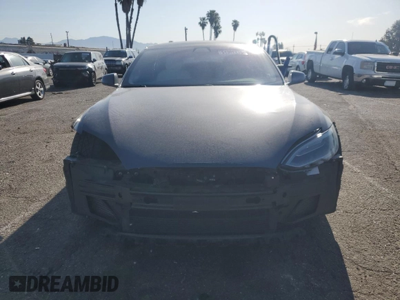 2017 Tesla Model S 100D с VIN 5YJSA1E23HF199497, выставлен на аукционе Copart как лот 51302475 с пробегом 61 993 миль миль и Списание • Salvage title. История ставок и продаж доступна на DreamBid. Изображение 5.