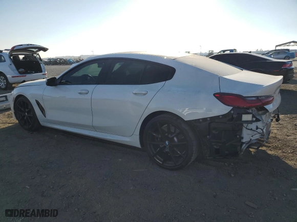 2022 BMW 8 Series 840i with VIN WBAGV2C0XNCG81832, listed as a Copart auction lot 74798684 with 27,972 mi miles and Salvage Title. Bid and sale history available at carsss.com. Image 2.