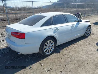 2015 Audi A6 Premium Plus z VIN WAUGFAFC4FN016103, wystawiony jako IAAI lot #41774479 z przebiegiem 125 412 mil mil oraz . Historia ofert i sprzedaży dostępna na DreamBid. Obrazek 4.