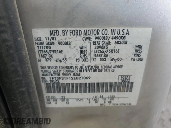 2002 Ford F-350 XL with VIN 1FTSF31F12EB21069, listed as a Copart auction lot 84287374 with 110,890 mi miles and Salvage Title. Bid and sale history available at DreamBid. Image 14.