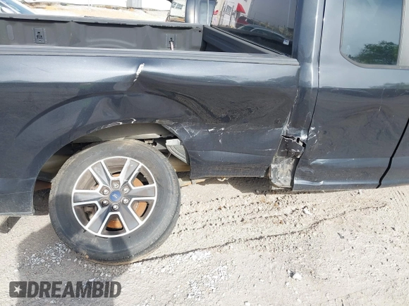 2015 Ford F-150 XL with VIN 1FTEX1CF2FKD12874, listed as a IAAI auction lot 41860610 with 242,215 mi miles. Bid and sale history available at carsss.com. Image 6.