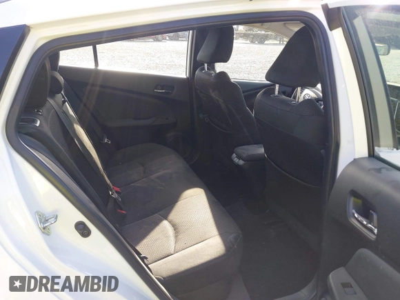 2020 Toyota Prius L Eco z VIN JTDKARFU5L3124692, wystawiony jako IAAI lot #42019339 z przebiegiem 178 081 mil mil oraz . Historia ofert i sprzedaży dostępna na DreamBid. Obrazek 8.