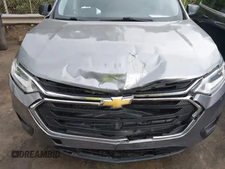 2020 Chevrolet Traverse LS with VIN 1GNERFKW5LJ245009, listed as a IAAI auction lot 42029854 with 77,771 mi miles and . Bid and sale history available at DreamBid. Image 6.