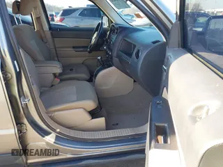 2011 Jeep Patriot Sport with VIN 1J4NT1GA1BD220156, listed as a IAAI auction lot 41760424 with 100,336 mi miles and . Bid and sale history available at carsss.com. Image 5.