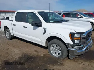 2023 Ford F-150 XL with VIN 1FTEW1C51PKE77973, listed as a IAAI auction lot 42034951 with 39,465 mi miles. Bid and sale history available at carsss.com. Image 1.