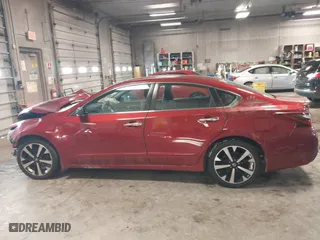 2018 Nissan Altima 2.5 SV with VIN 1N4AL3AP5JC198699, listed as a IAAI auction lot 41609046 with 60,807 mi miles. Bid and sale history available at carsss.com. Image 14.