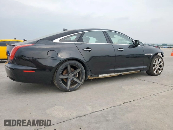 2015 Jaguar XJ with VIN SAJWA1CZ8F8V85381, listed as a Copart auction lot 57464225 with 161,938 mi miles and Salvage Title. Bid and sale history available at DreamBid. Image 3.