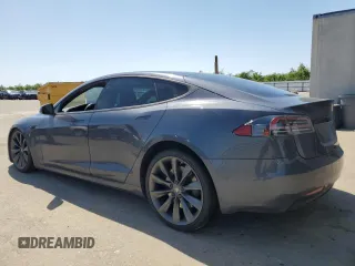 2016 Tesla Model S 90D with VIN 5YJSA1E22GF177120, listed as a Copart auction lot 51972885 with 73,441 mi miles and Salvage title. Bid and sale history available at DreamBid. Image 2.