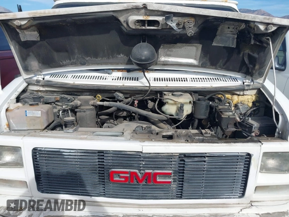 1995 GMC Vandura z VIN 1GTEG25K5SF548518, wystawiony jako IAAI lot #40664471 z przebiegiem 157 506 mil mil oraz . Historia ofert i sprzedaży dostępna na DreamBid. Obrazek 10.