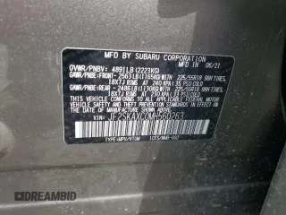 2021 Subaru Forester Touring z VIN JF2SKAXC0MH560263, wystawiony jako Copart lot #61453195 z przebiegiem Nie podano mil oraz Szkoda całkowita • Salvage title. Historia ofert i sprzedaży dostępna na DreamBid. Obrazek 13.
