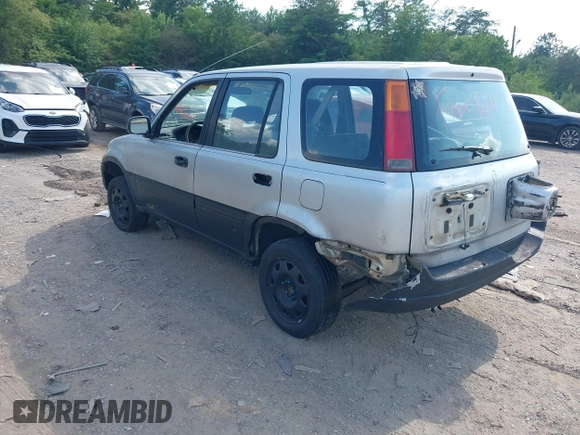 1998 Honda CR-V LX with VIN JHLRD2841WC018466, listed as a IAAI auction lot 42142021 with 184,505 mi miles. Bid and sale history available at carsss.com. Image 3.