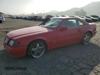 1994 Mercedes-Benz SL 5.0L with VIN WDBFA67E8RF093953, listed as a Copart auction lot 82842744 with 83,917 mi miles and Salvage title. Bid and sale history available at DreamBid. Image 1.